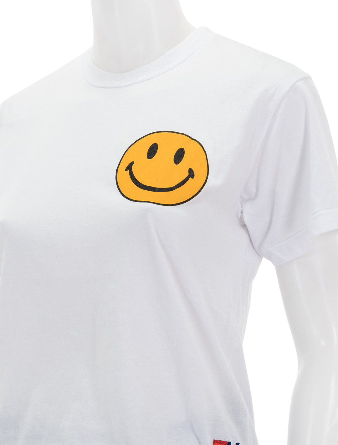 Close-up view of Aviator Nation's smiley 2 boyfriend tee in white.