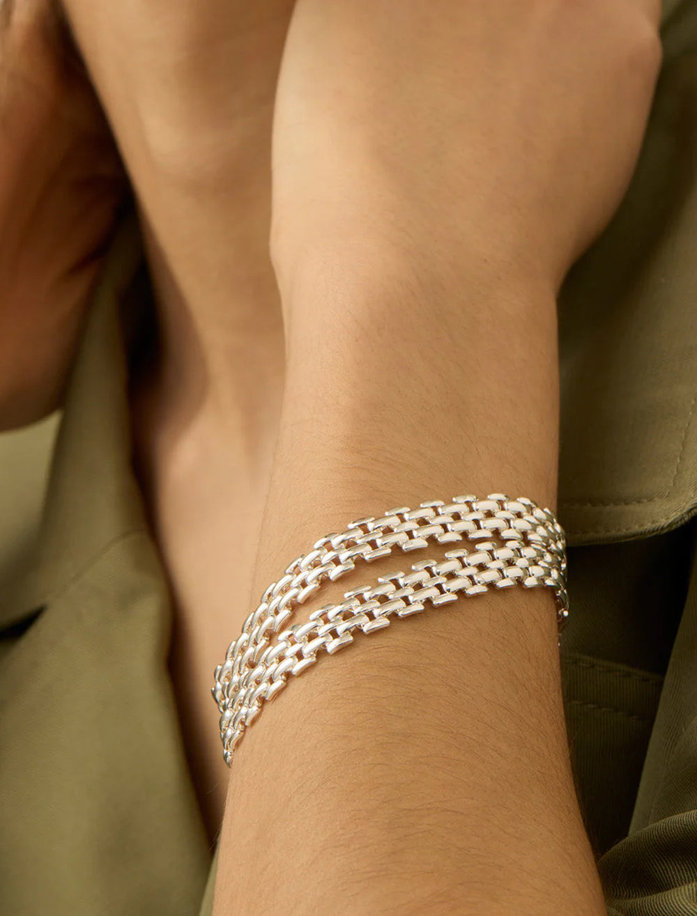 Model wearing Jenny Bird's francis mega bracelet in silver.