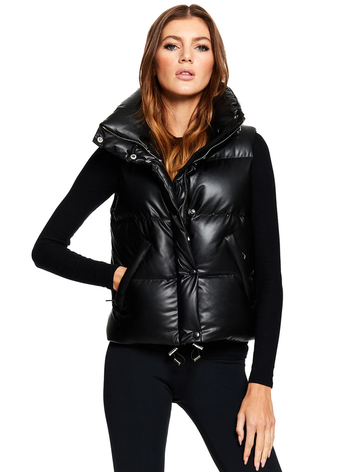 Model wearing SAM.'s arley vegan leather vest in black.