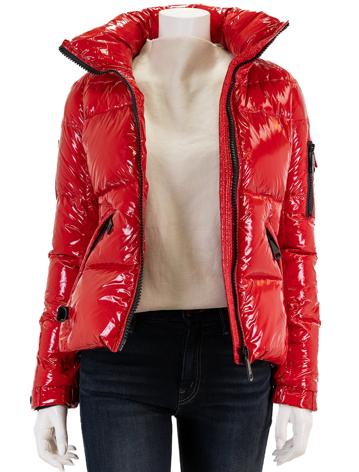 Front view of SAM.'s freestyle jacket in salsa, unzipped.