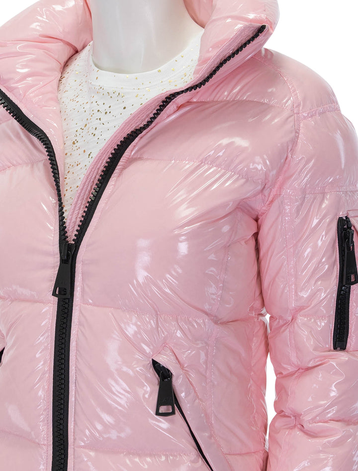 Close-up view of SAM's freestyle jacket in cotton candy.