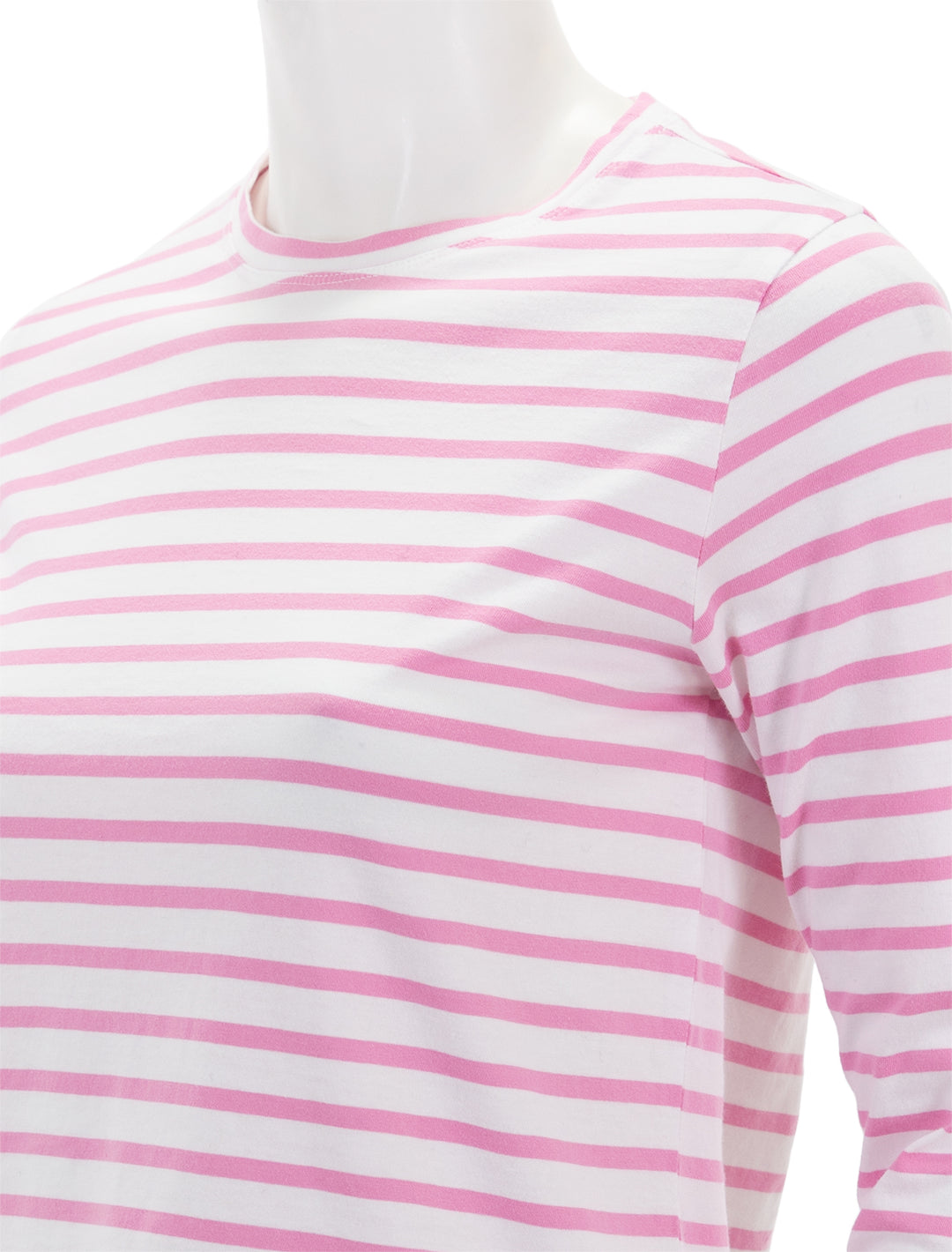Close-up view of KULE's the modern long sleeve tee in pink and white stripe.