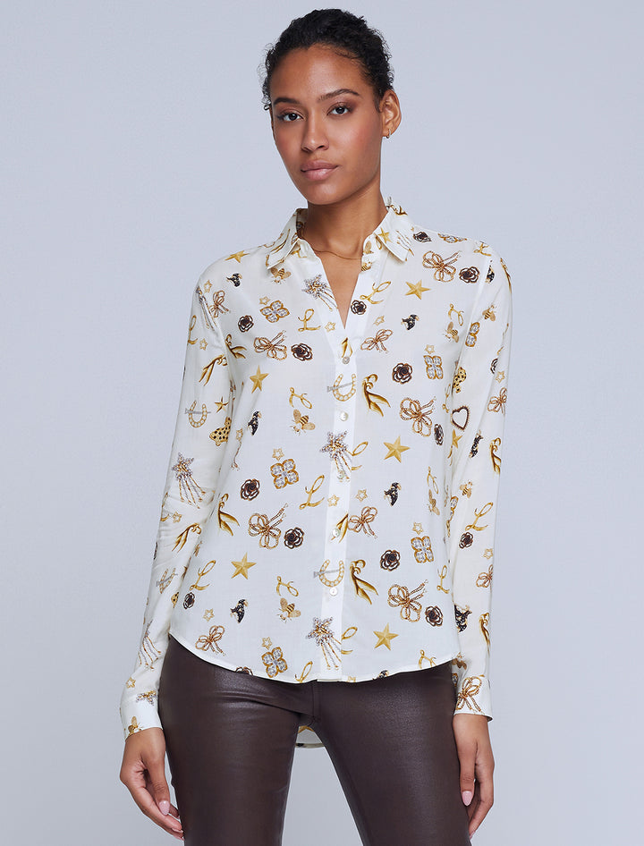 Model wearing L'agence's holly in ecru multi brooch print.