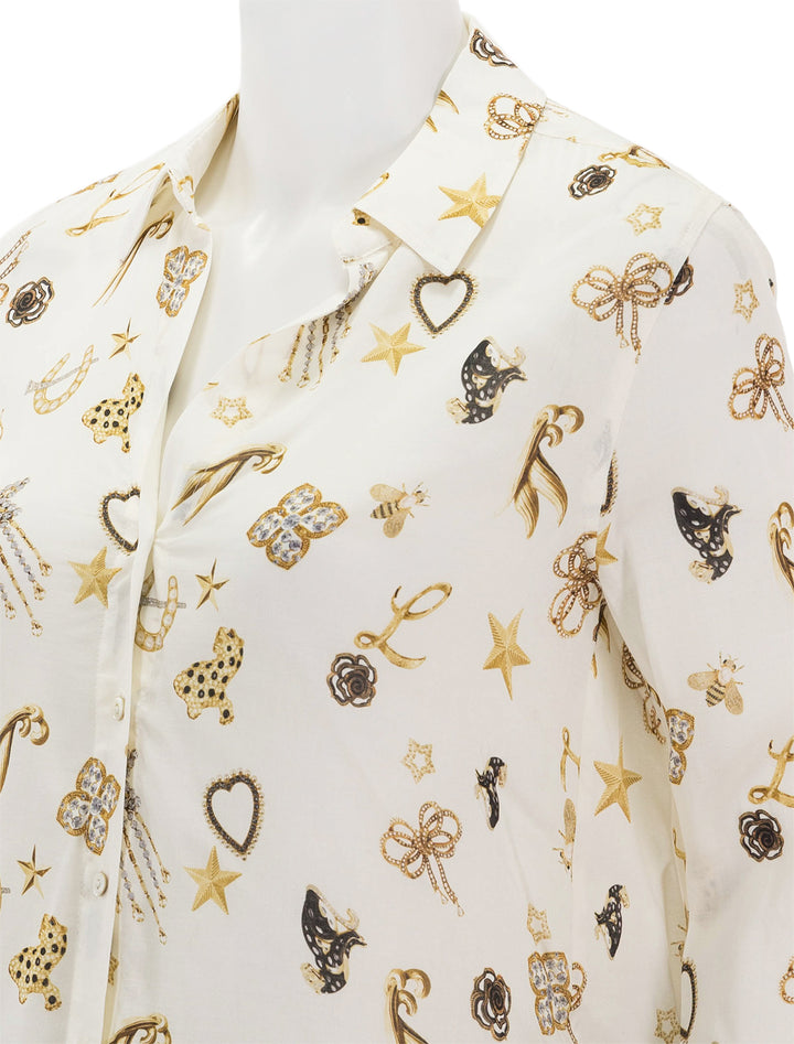 Close-up view of L'agence's holly in ecru multi brooch print.