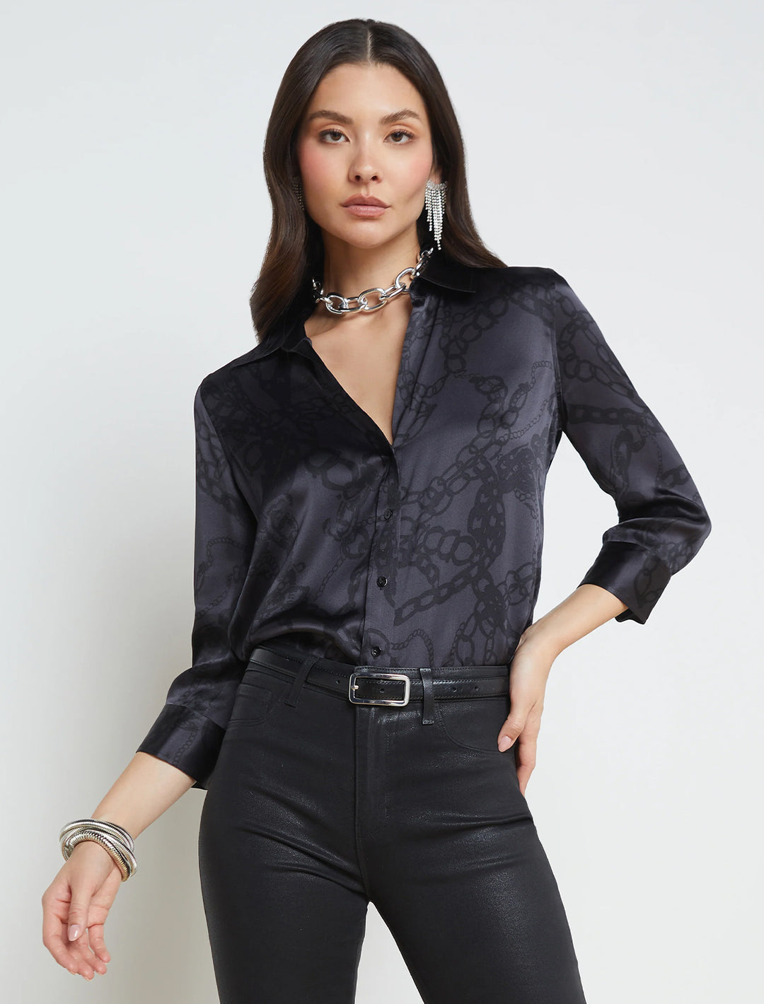 Model wearing L'agence's dani in black in black allover chain.