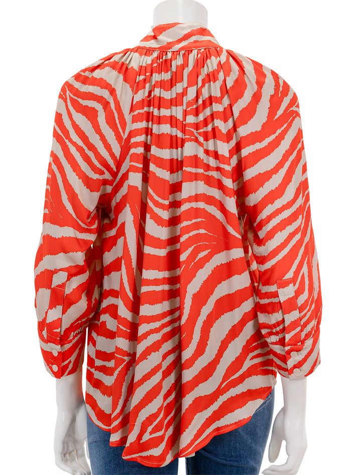 Back view of Smythe's gathered blouse in vermilion zebra.