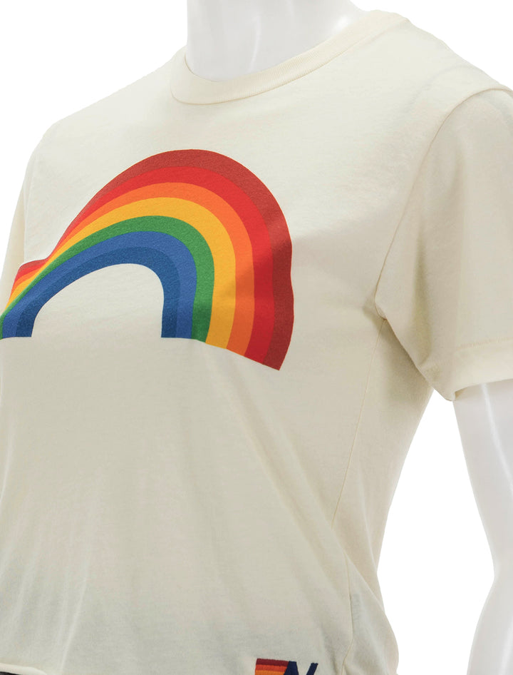 Close-up view of Aviator Nation's big rainbow boyfriend tee in vintage white.