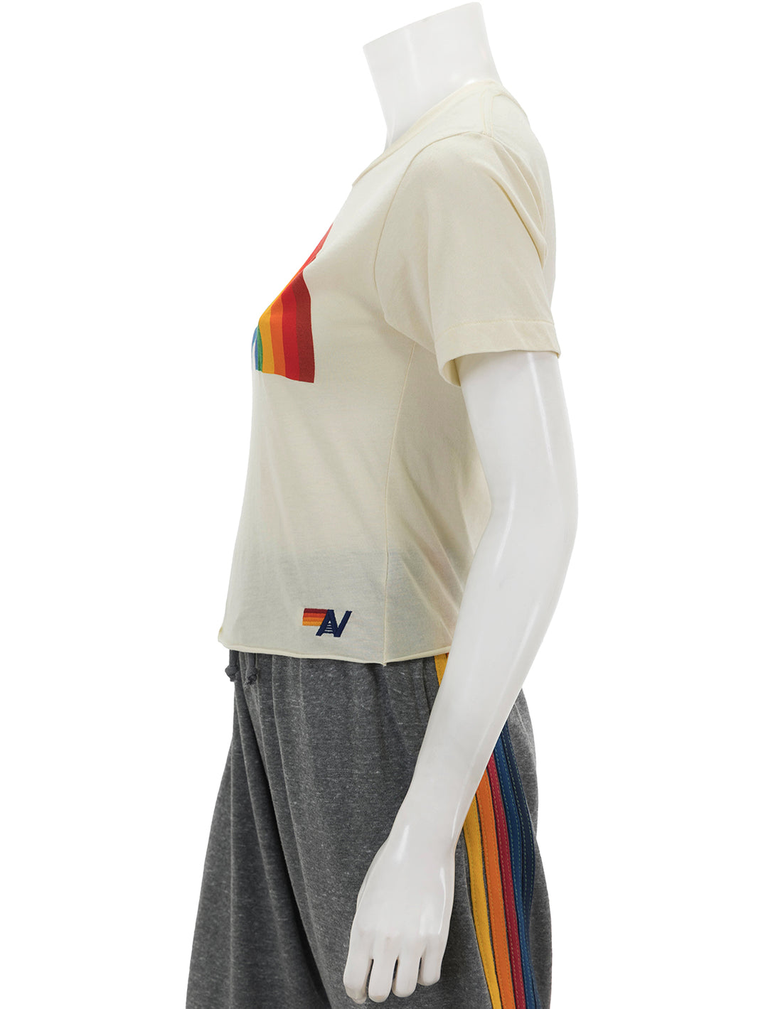 Side view of Aviator Nation's big rainbow boyfriend tee in vintage white.
