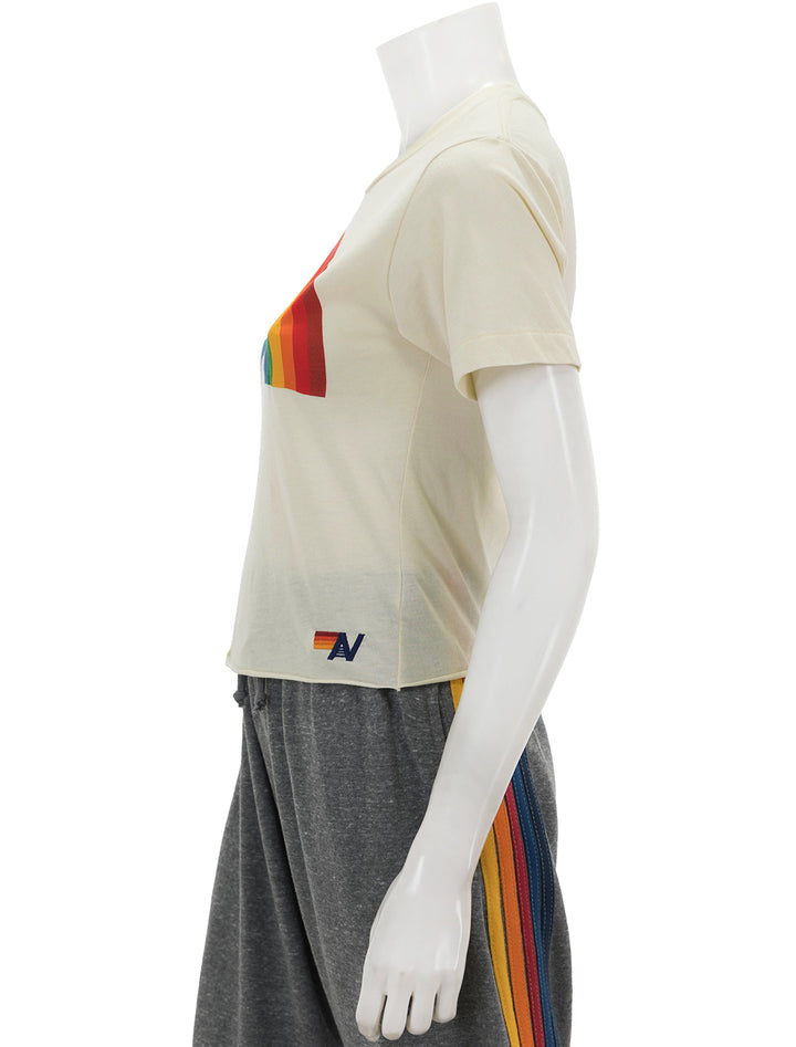 Side view of Aviator Nation's big rainbow boyfriend tee in vintage white.