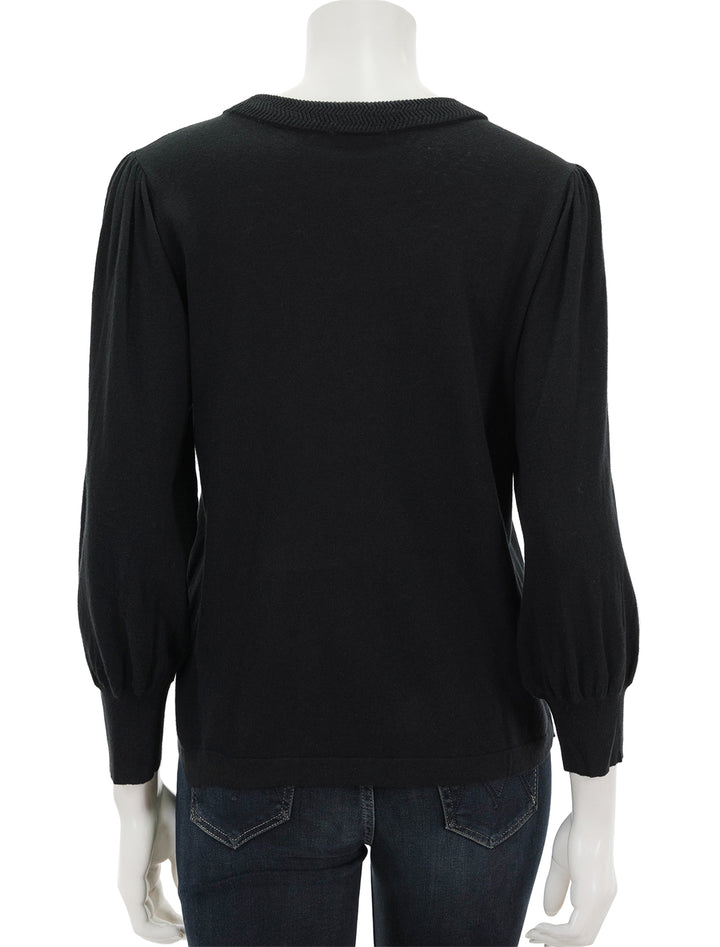 Back view of Lilla P.'s rib trim puff sleeve sweater in black.