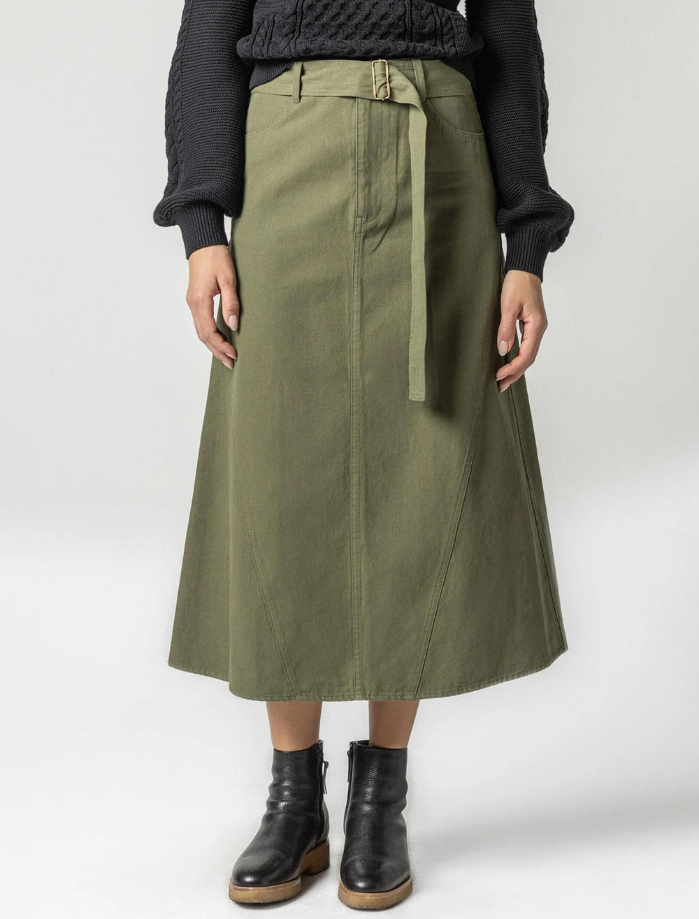 Model wearing Lilla P.'s jean skirt in army.