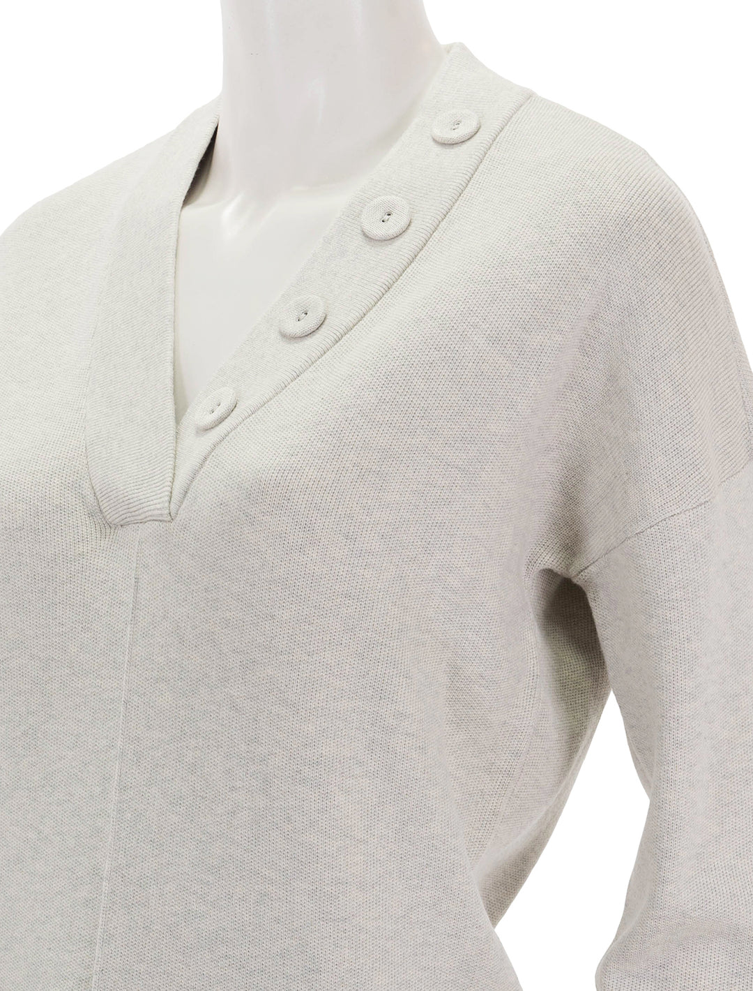 Close-up view of Lilla P.'s easy button shawl collar sweater in gardenia.
