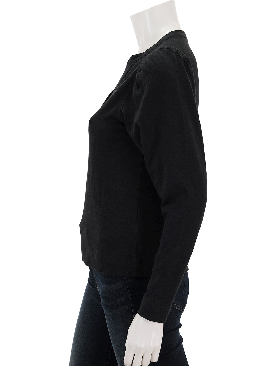 Side view of Lilla P.'s shirred long sleeve split neck in black.