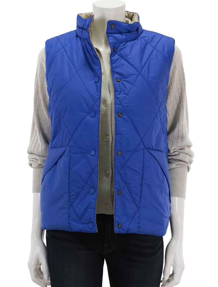 Front view of Lilla P.'s reversible snap front vest in sapphire.
