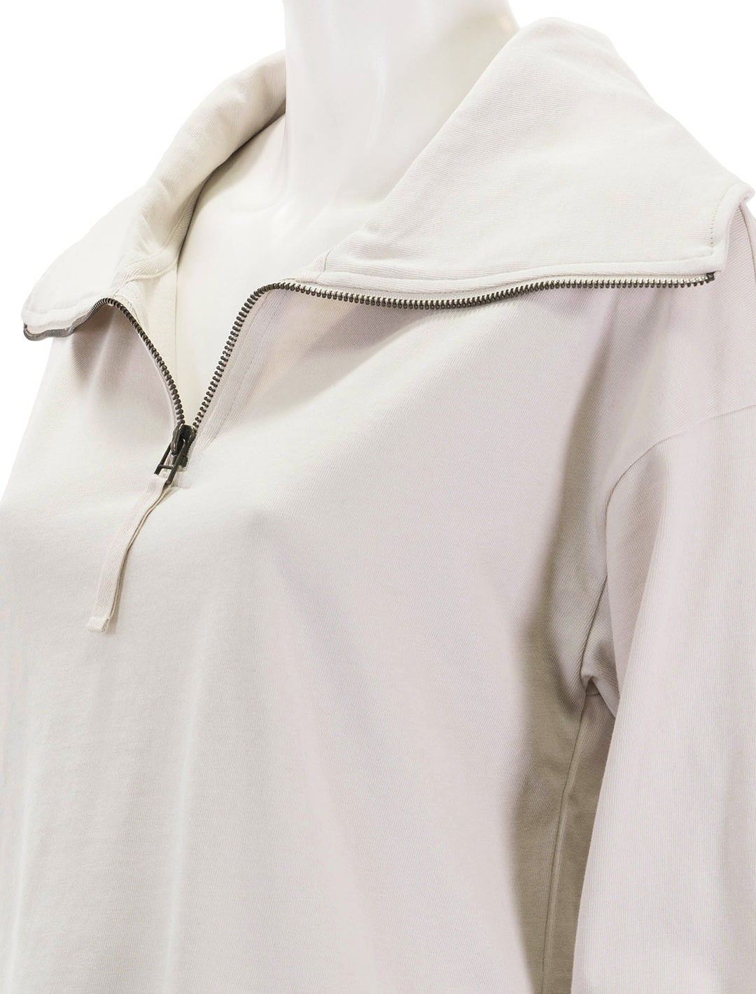 Close-up view of Lilla P.'s full sleeve half zip pullover in alabaster.