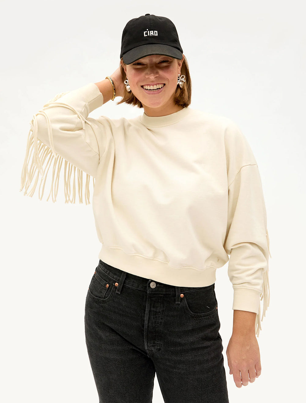 Model wearing Clare V.'s ciao baseball hat in black and white.