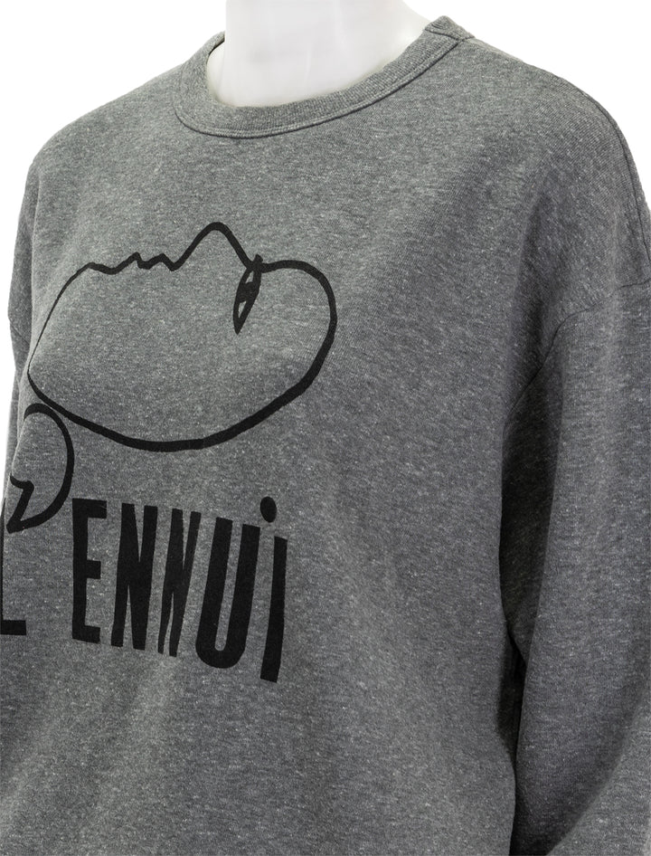 Close-up view of Clare V.'s l'ennui sweatshirt.