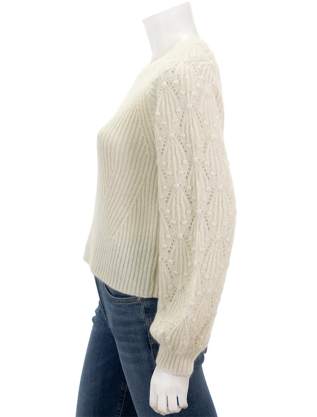 Side view of Splendid's rayne sweater in snow.