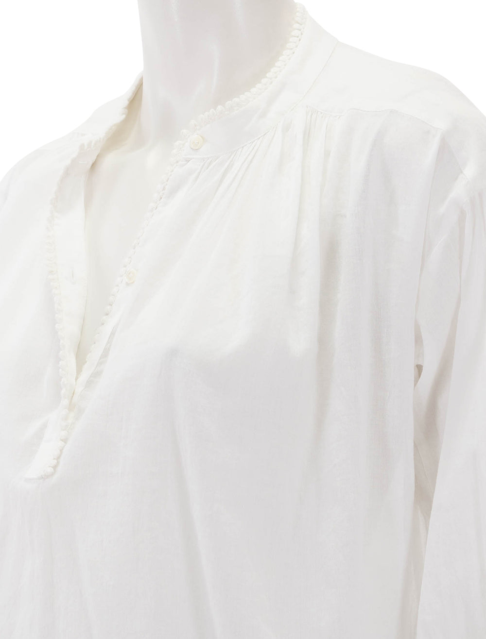 Close-up view of Nili Lotan's marcel top in ivory.