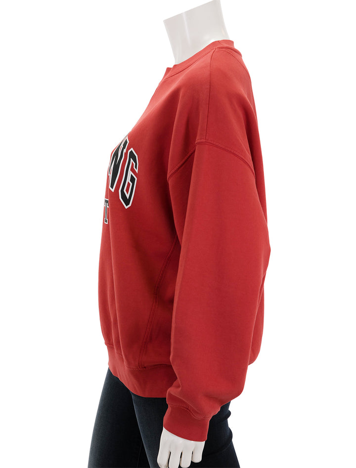 Side view of Anine Bing's jaci sweatshirt in red.