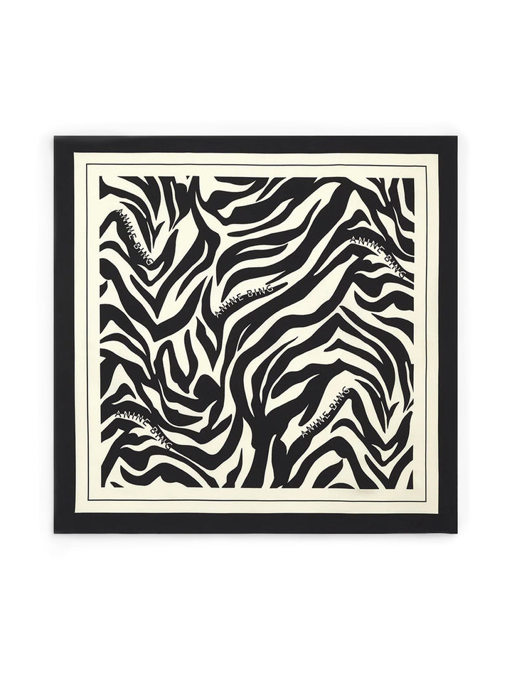 Overhead view of Anine Bing's evelyn scarf | black and cream zebra.