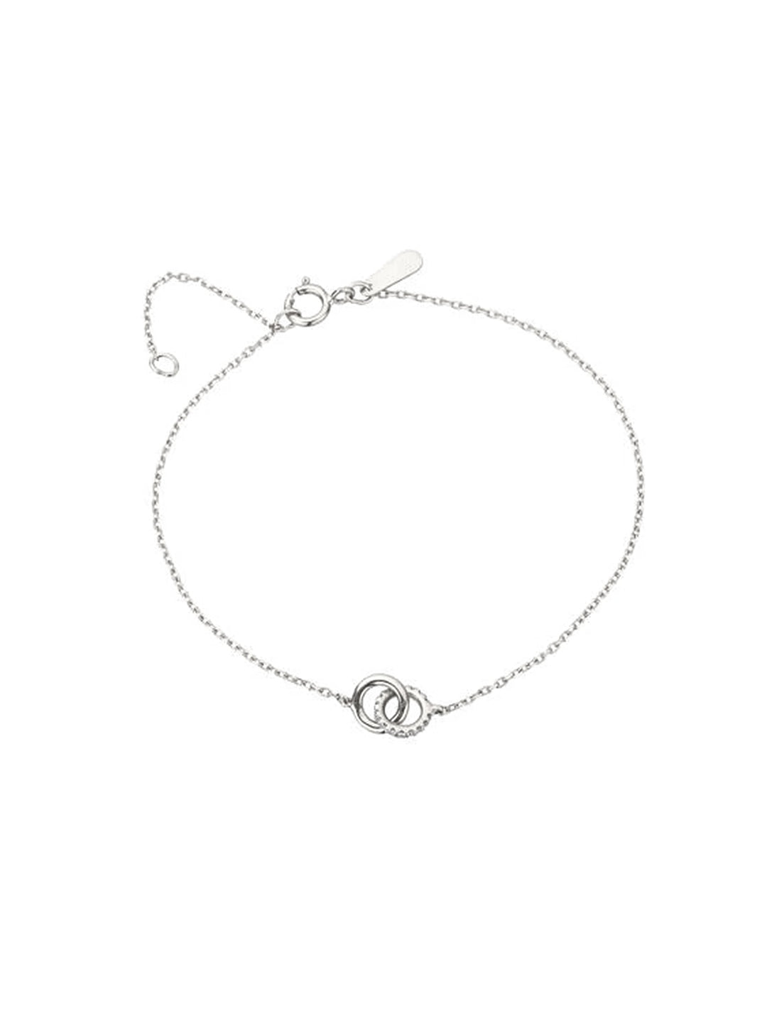 Overhead view of Adina Reyter's pave interlocking loop bracelet in silver.