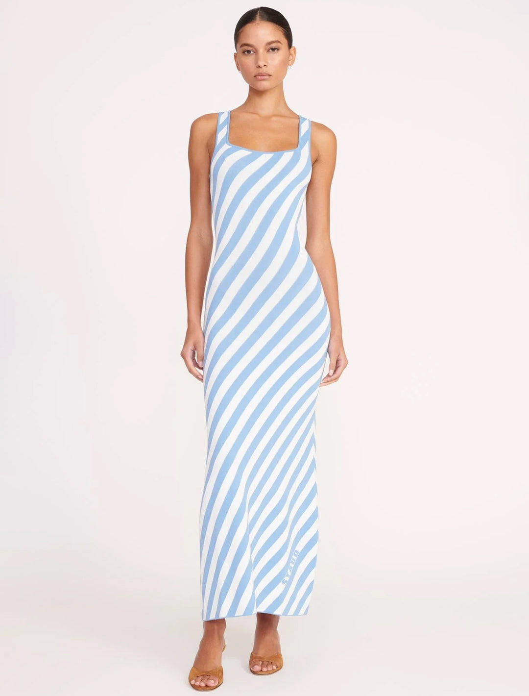 Model wearing STAUD's katie dress in blue seashore stripe.