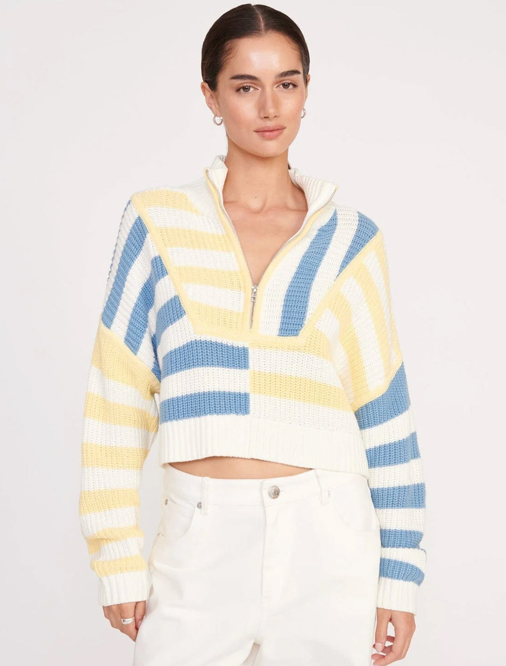 Model wearing STAUD's cropped hampton sweater in buttercup seashore stripe.