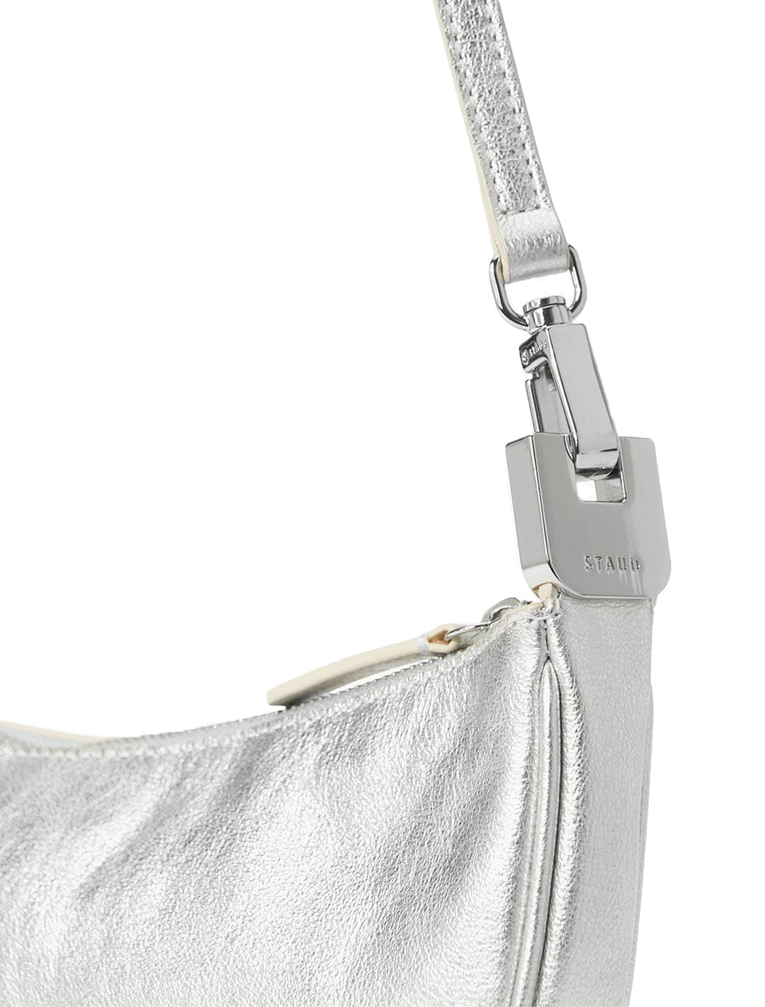Close-up view of STAUD's walker shoulder bag in silver strap