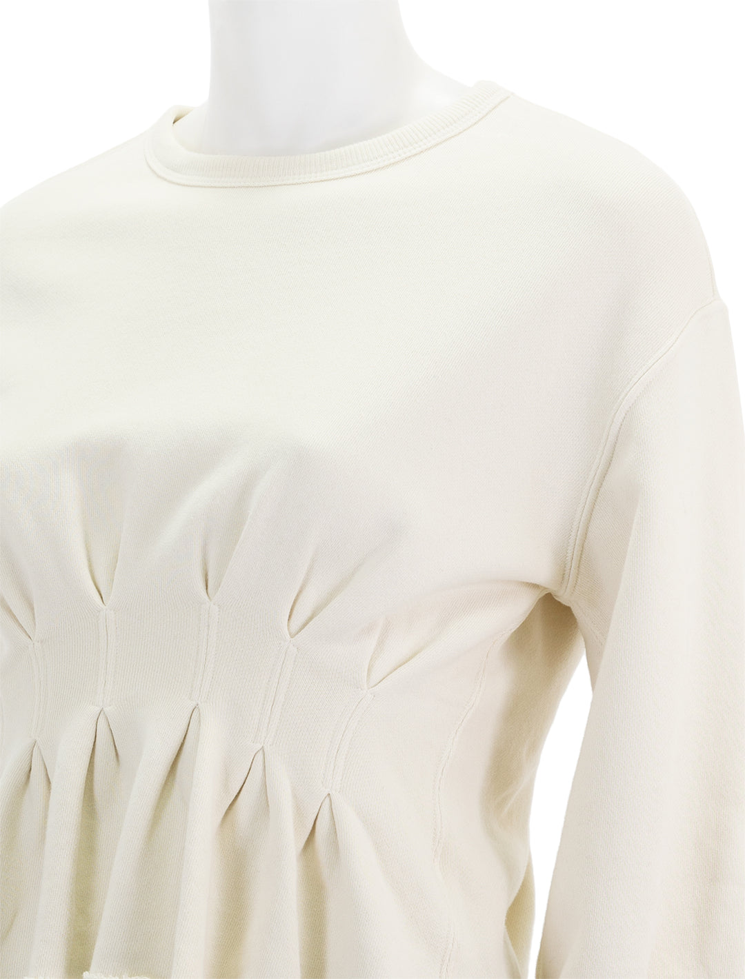 Close-up view of The Great's the corset sweatshirt in washed white.