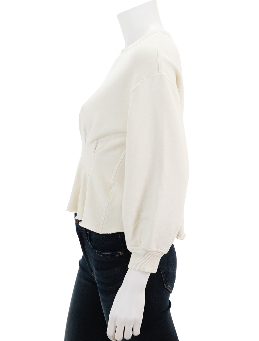 Side view of The Great's the corset sweatshirt in washed white.