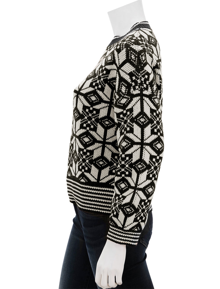 Side view of The Great's the snowflake pullover in licorice.