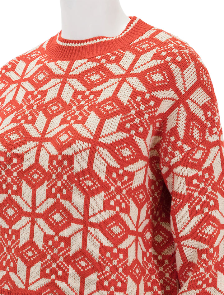 Close-up view of The Great's the snowflake pullover in alpine spice.
