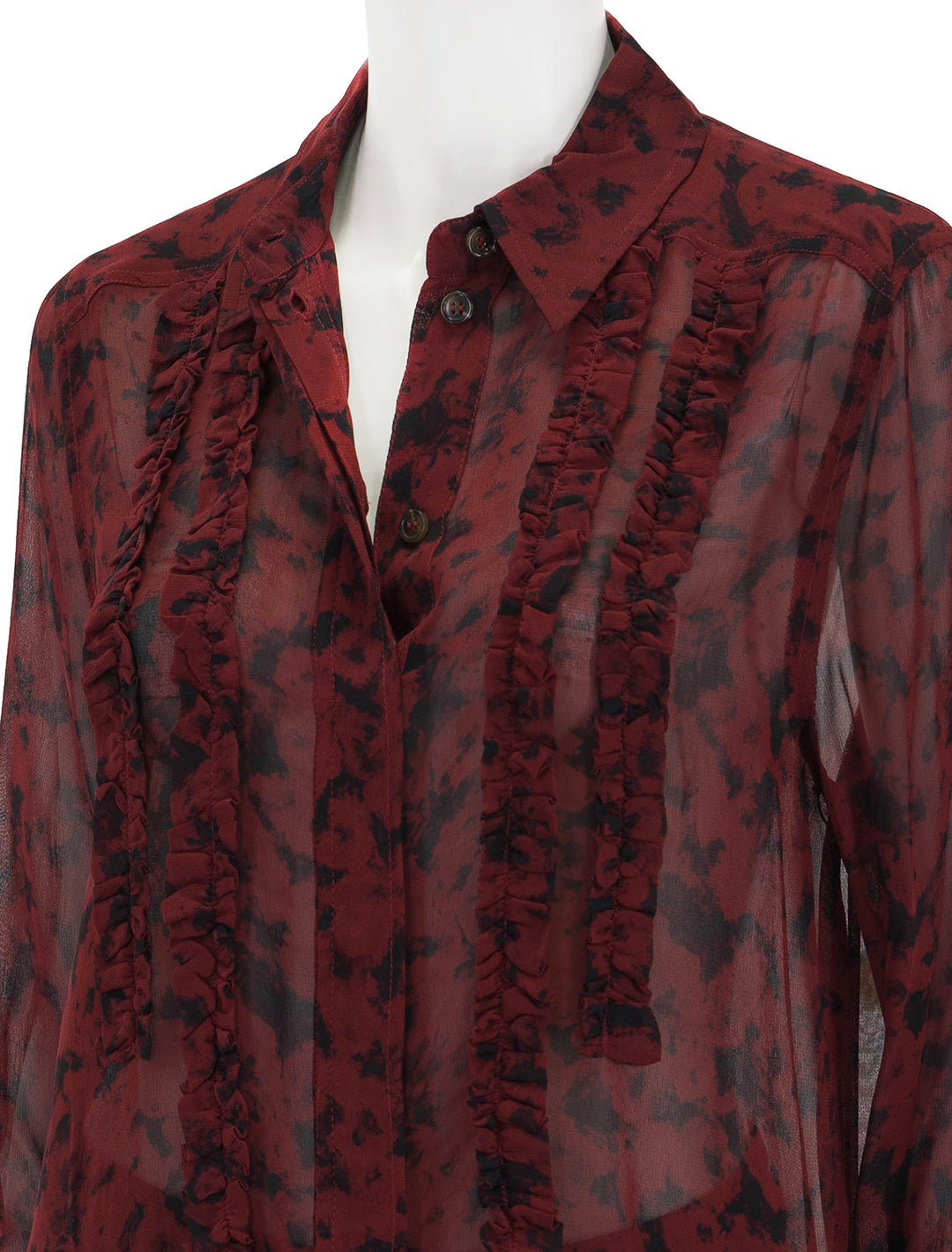 Close-up view of GANNI's georgette ruffle shirt in syrah.