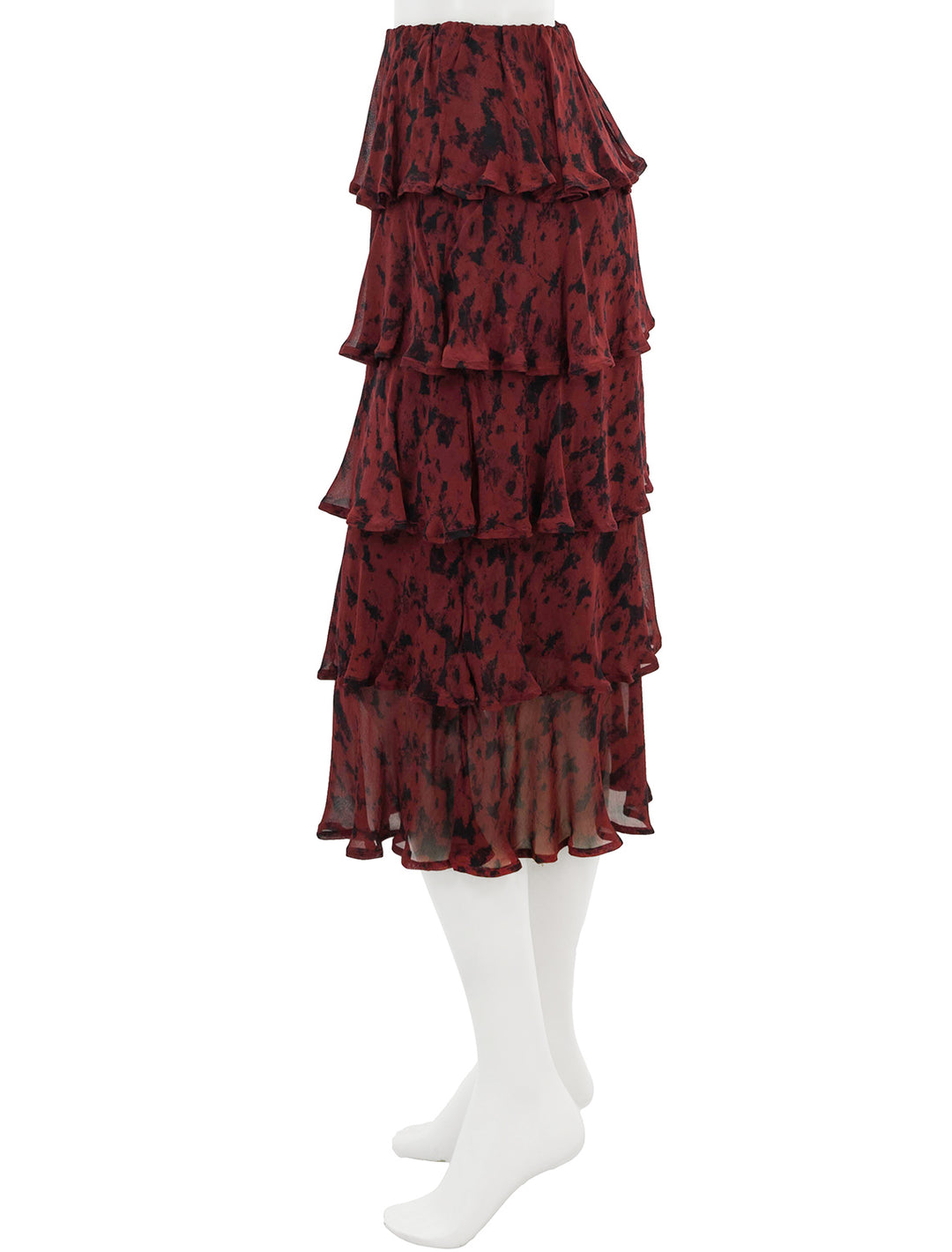 Side view of GANNI's tiered skirt in syrah.