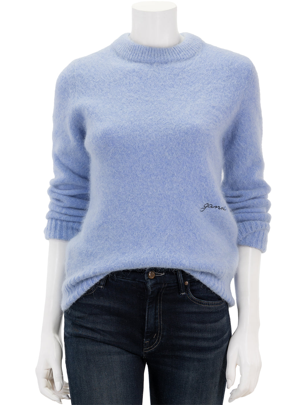Front view of GANNI's brushed alpaca o-neck pullover in powder blue.