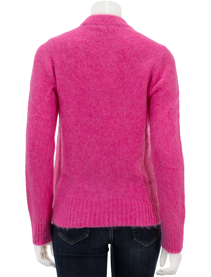 Back view of GANNI's brushed alpaca o-neck pullover in cone flower.