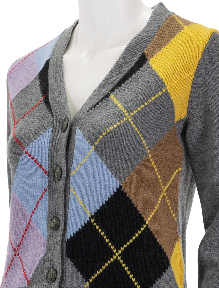 Close-up view of GANNI's harlequin wool cardigan in frost grey.