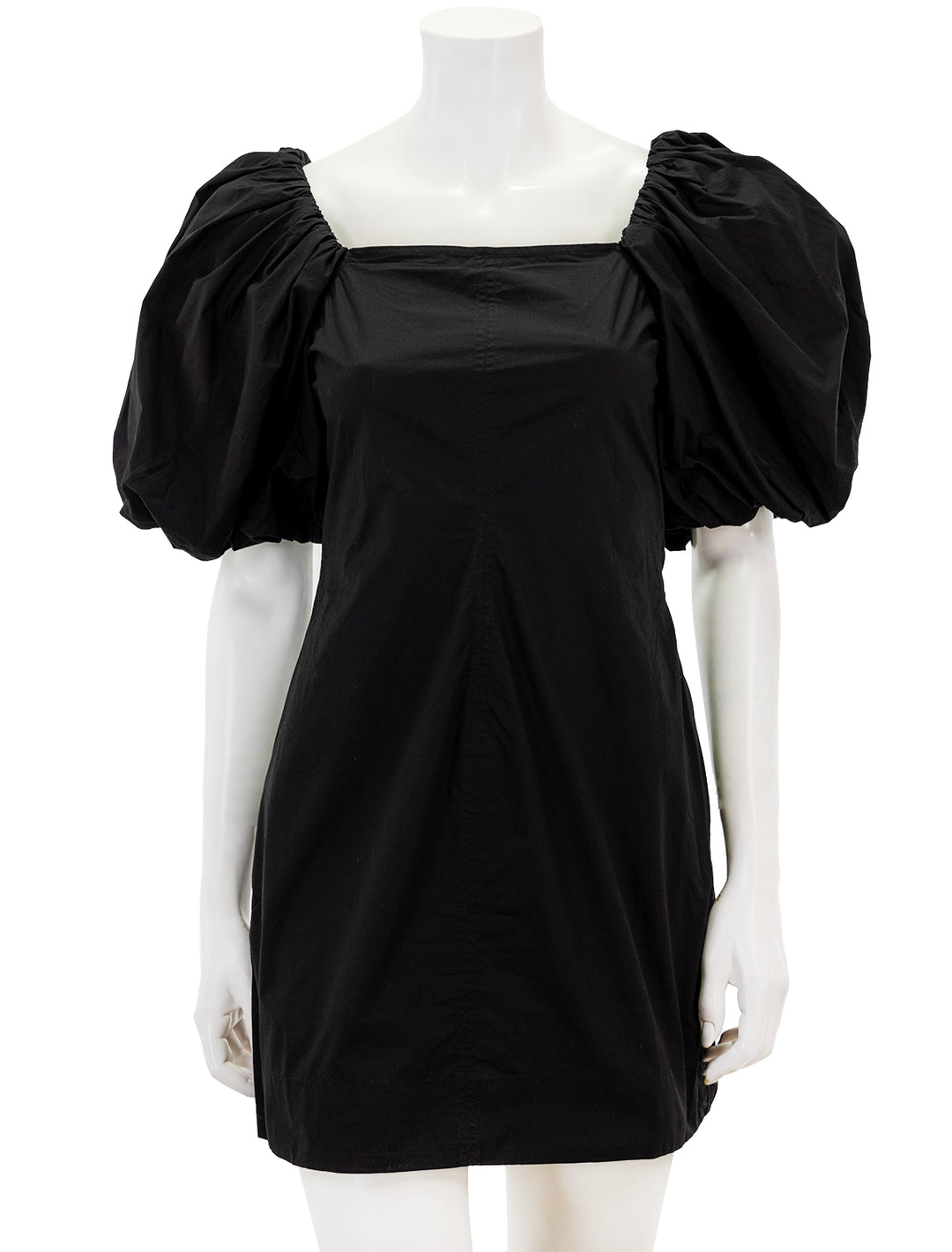 Front view of GANNI's cotton poplin twisted sleeve mini dress in black.