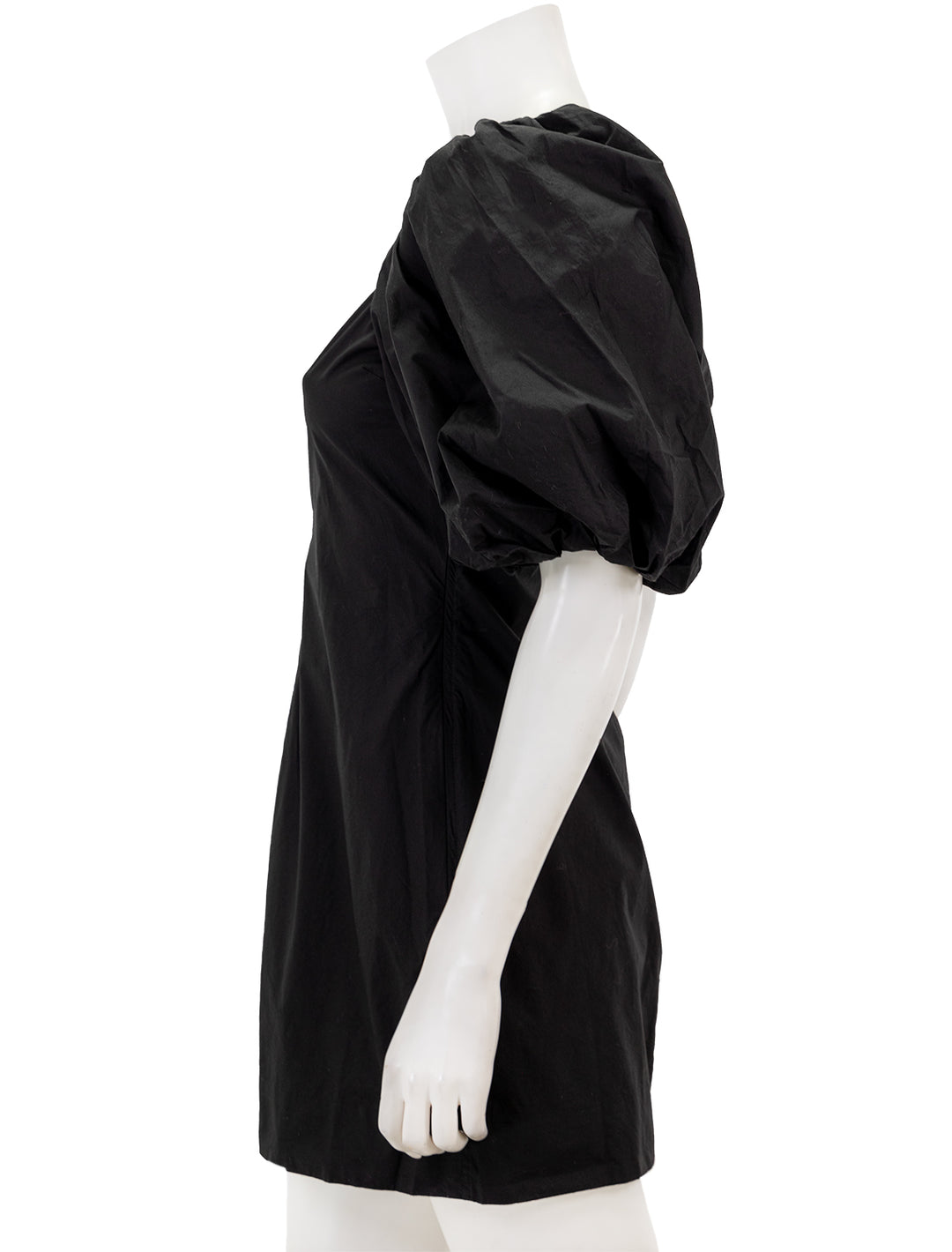 Side view of GANNI's cotton poplin twisted sleeve mini dress in black.