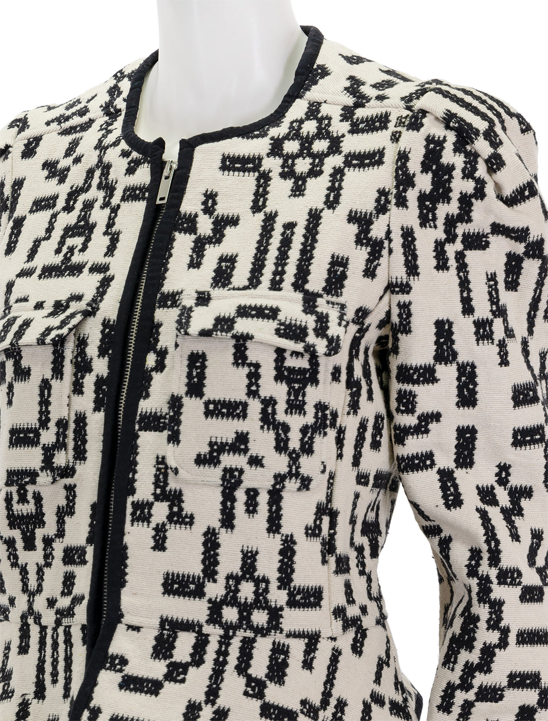 Close-up view of Isabel Marant Etoile's deliona jacket in black and white.