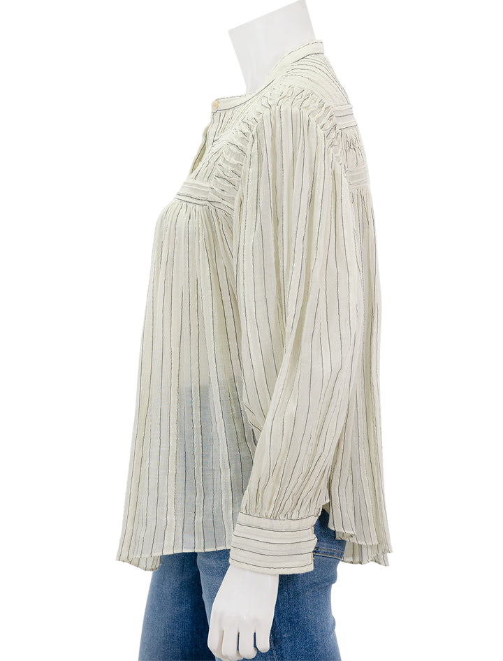 Side view of Isabel Marant Etoile's plalia top in ecru.