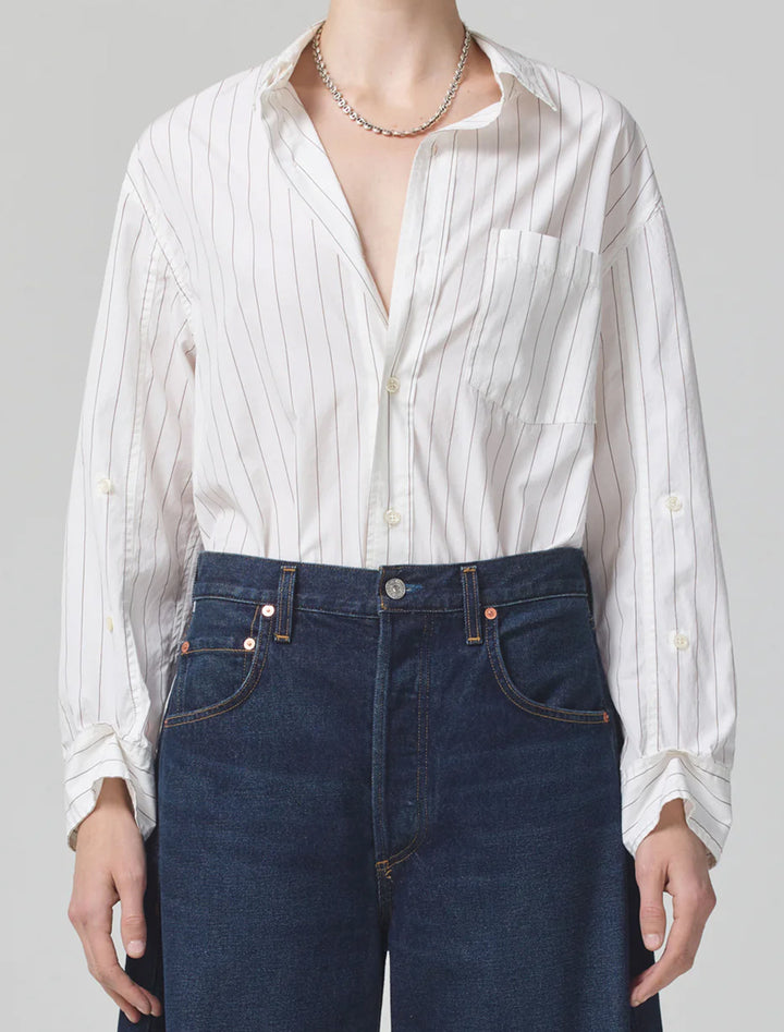 Model wearing Citizens of Humanity's kayla shirt in bitter chocolate stripe.