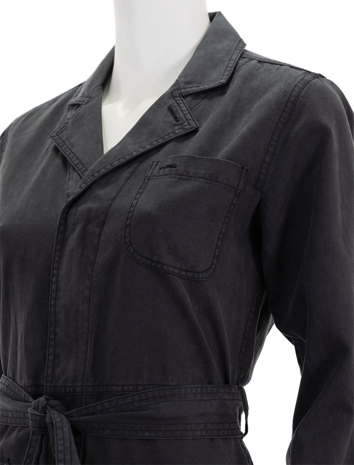 Close-up view of Alex Mill's standard zip jumpsuit in black.