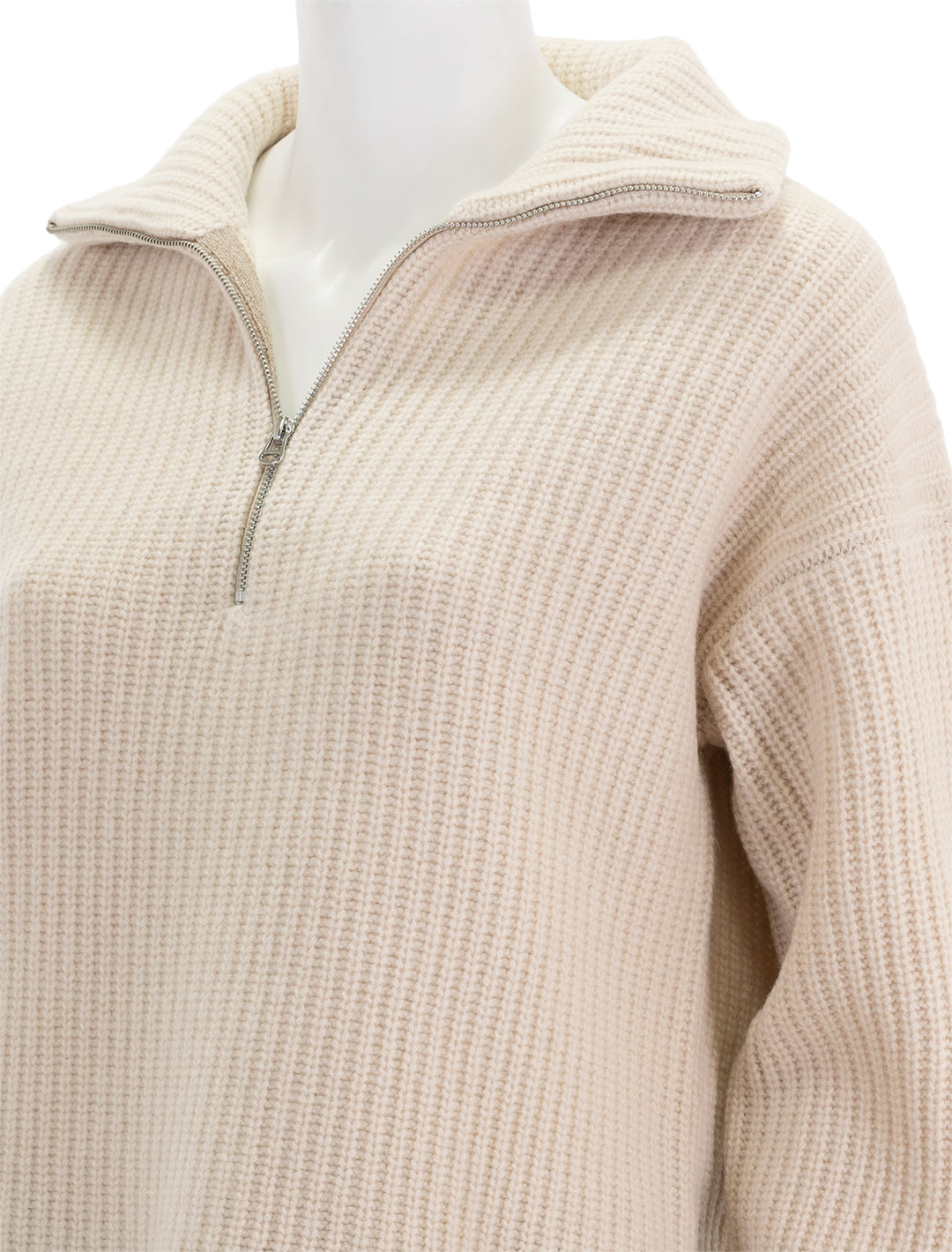 Close-up view of Alex Mill's felix zip merino pullover in buttermilk.