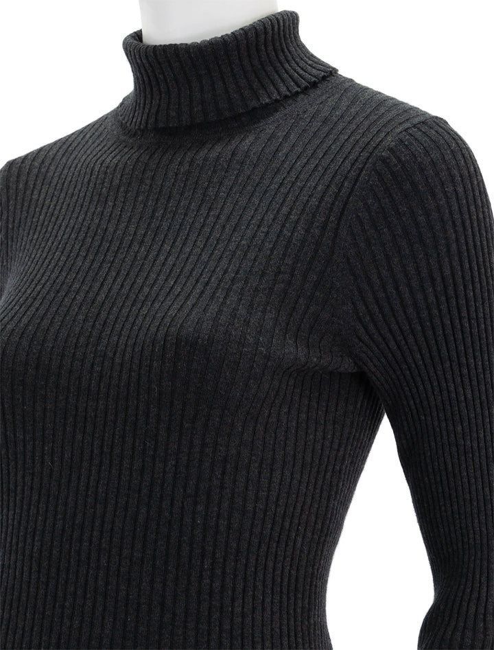 Close-up view of Alex Mill's cristy ribbed turtleneck in charcoal.