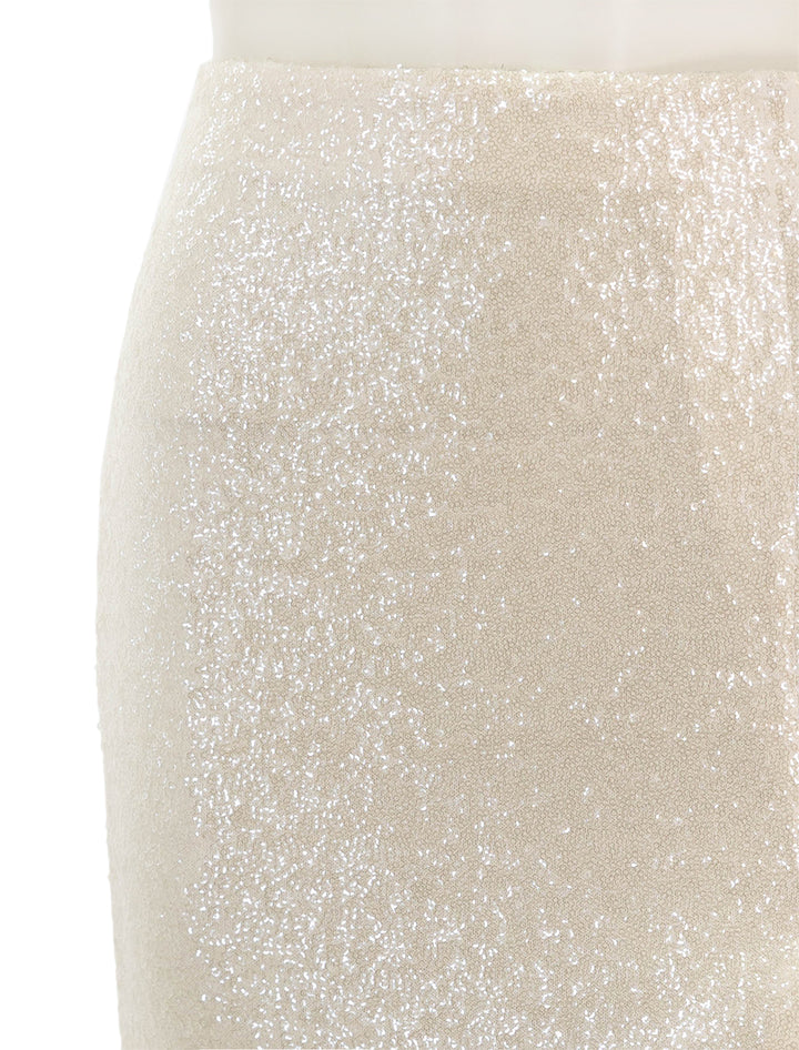 Close-up view of Saint Art's Celine Midi Wrap Skirt in Ivory Sequin.