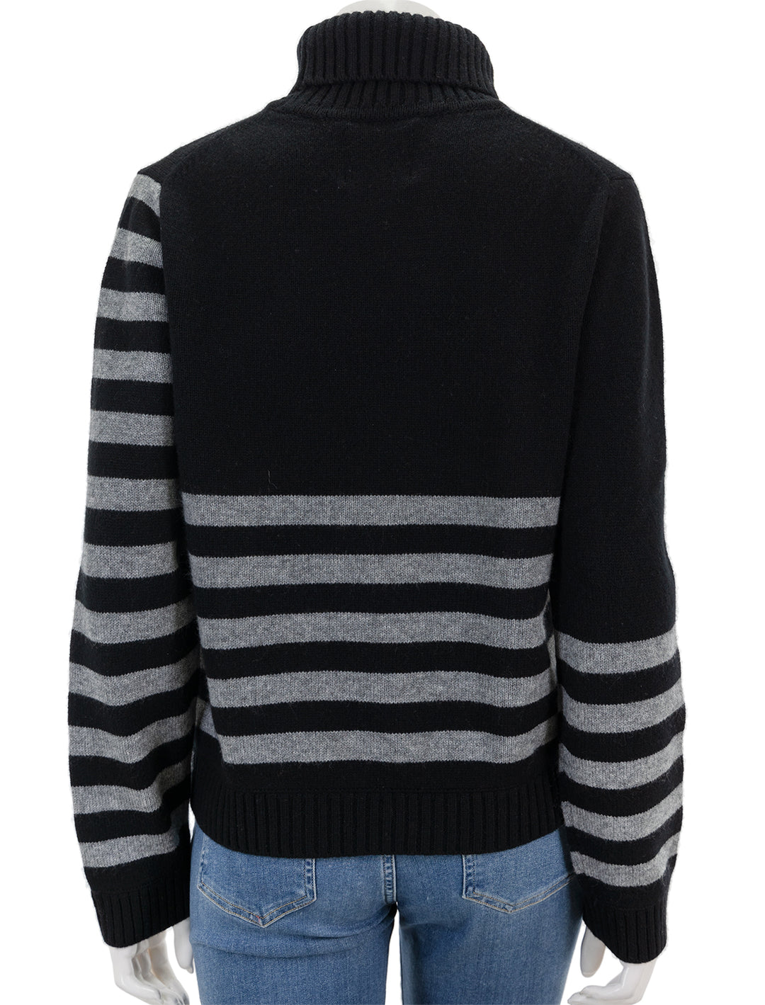 Back view of Jumper 1234's invert stripe roll collar sweater in black and cloud.