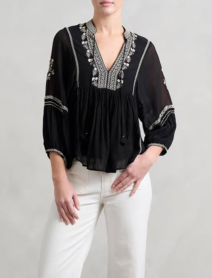 Model wearing Vanessa Bruno's baltic blouse in noir.