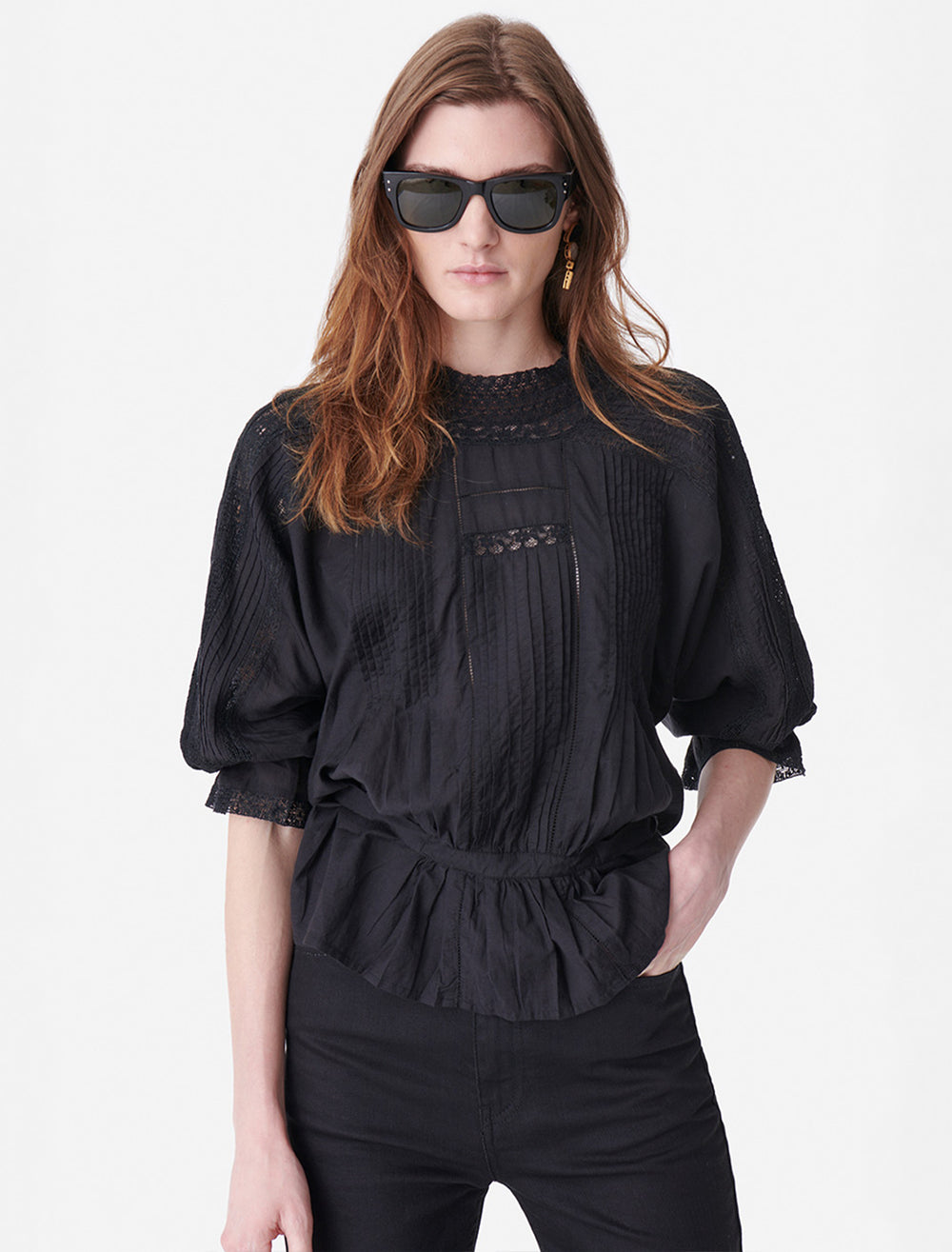 Model wearing Vanessa Bruno's viva blouse in noir.